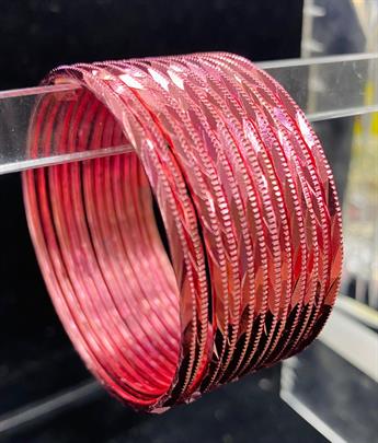 Set of 12 coloured metal bangles. Perfect to style with any outfit and to wear on any occassion.