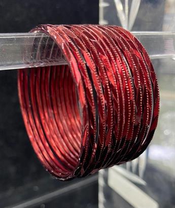 Set of 12 coloured metal bangles. Perfect to style with any outfit and to wear on any occassion.