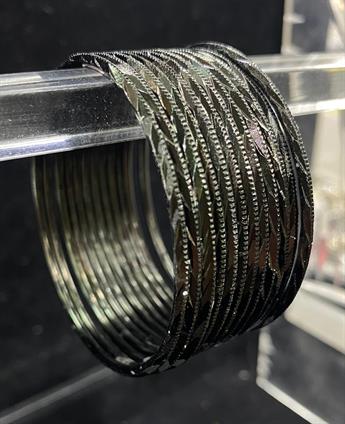 Set of 12 coloured metal bangles. Perfect to style with any outfit and to wear on any occassion.