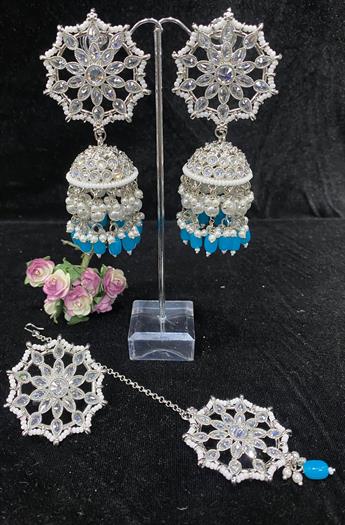 EARING AND TIKKA SET, COMES WITH MATCHING RING.