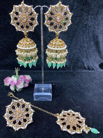 EARING AND TIKKA SET, COMES WITH MATCHING RING.
