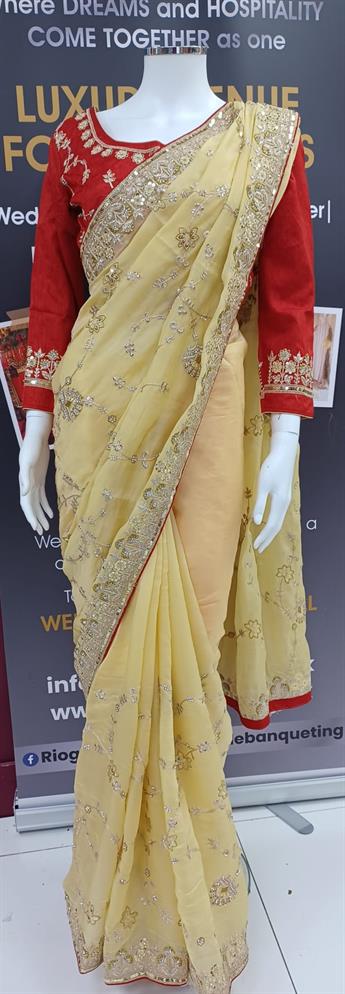 Organza saree with  readymade long sleeve blouse.Size10/12.
It is great to wear on partywear, weddi