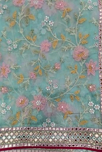 Organza saree with  readymade long sleeve blouse.Size10/12.
It is great to wear on partywear, weddi