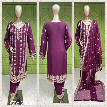 This readymade attire features detailed handwork of thread,dabka and, sequins on the kameez front, a