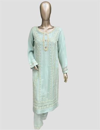 This readymade attire features detailed handwork of thread,dabka and, sequins on the kameez front, a