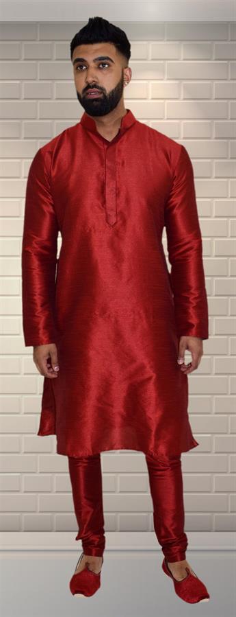 Silk art dupion kurta pajma with simple button on the neckline comes complete with pajma