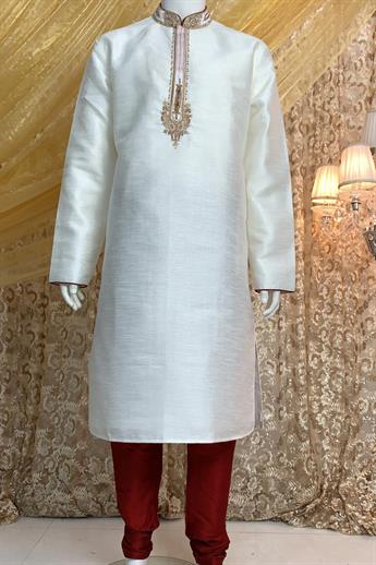 Mint green brocade kurta with pajma With gold hand emb with touch of machine, on the neck line and c