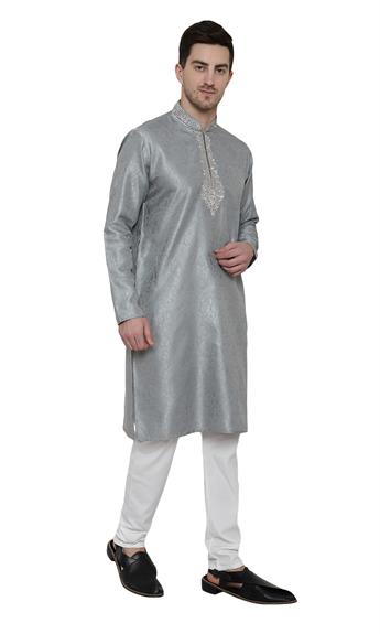 BROCADE KURTA PAJAMA WITH BEAUTIFUL MACHINE EMBROIDERY ON THE COLLAR AND NECK LINE.