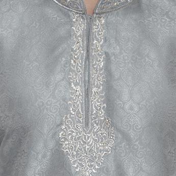 BROCADE KURTA PAJAMA WITH BEAUTIFUL MACHINE EMBROIDERY ON THE COLLAR AND NECK LINE.