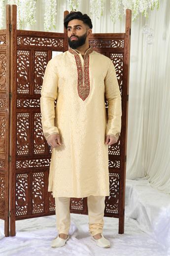 Gold brocade kurta pajma with neckline embroidery in gold/ maroon embellishment