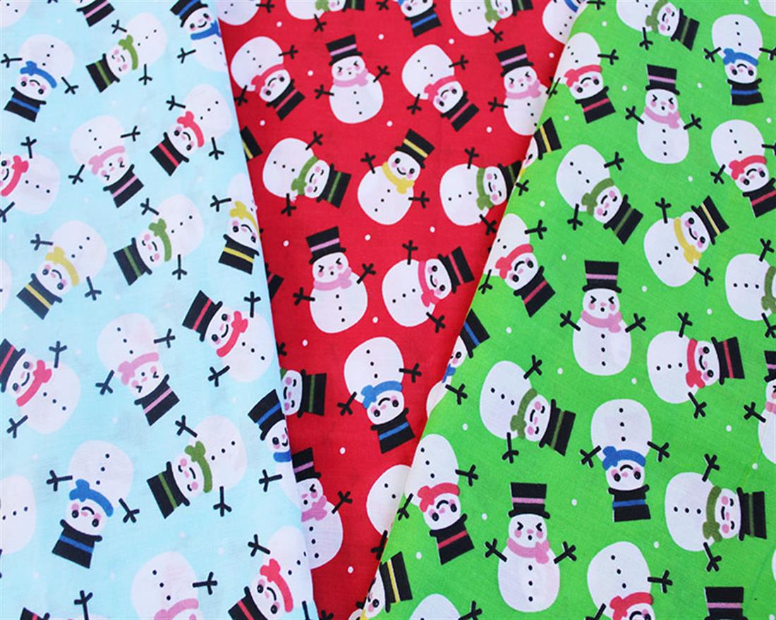 Green Printed Smiley Snowman - Poly Cotton Fabric Craft Quilting Patchwork