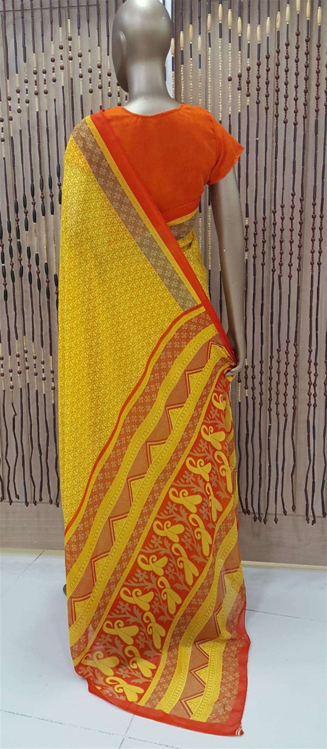 Yellow & Orange Printed Georgette Sarees
