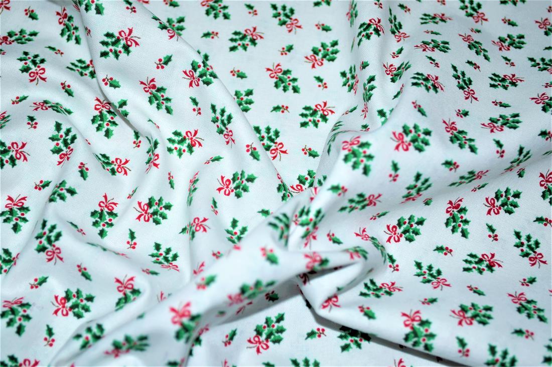 White 112 Cm Wide 100% Christmas Cotton Holly Print.