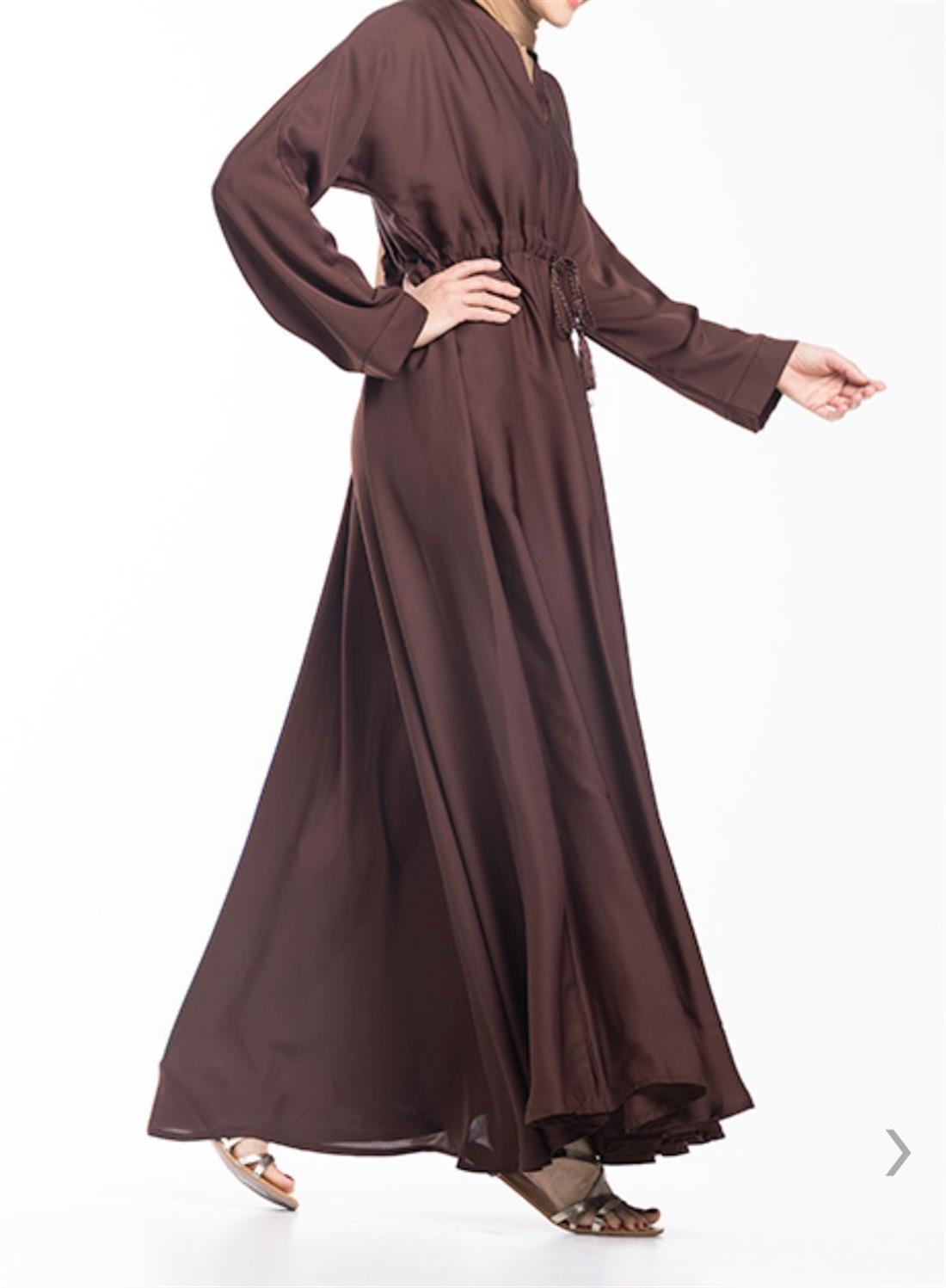 KIDS COLLECTION : 
The dress style features a V-neckline and a draw cord on the waistline to achieve a more structured fit. The Nida fabric compliments the full flare cut umbrella bottom.