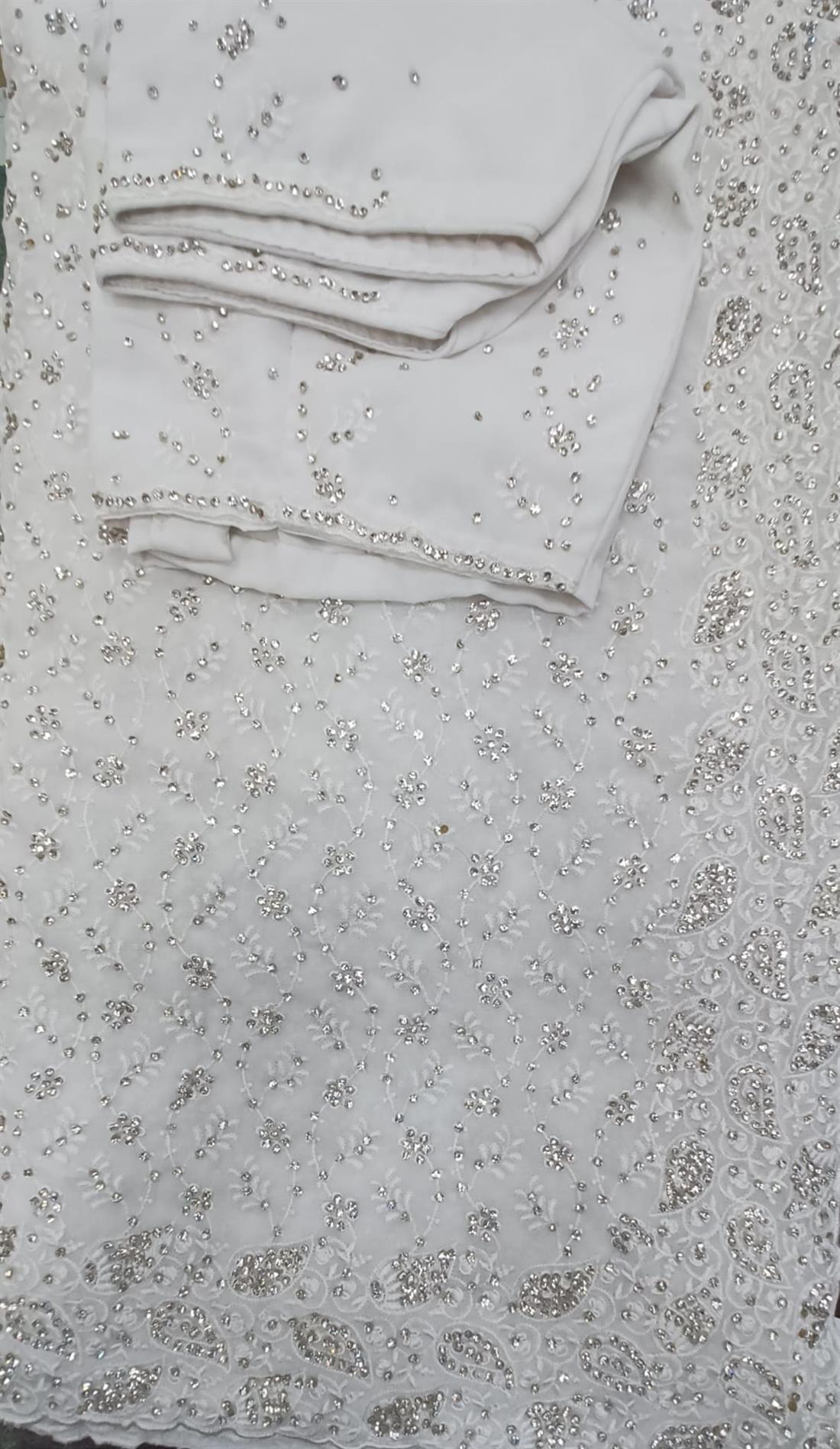 White Georgette Saree.