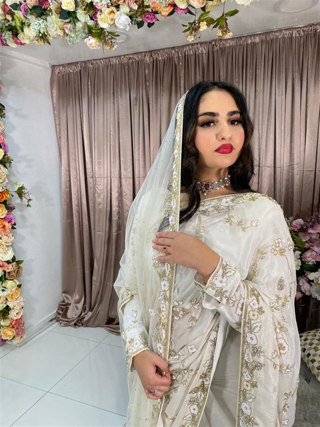 Off White Crape Silk Saree.