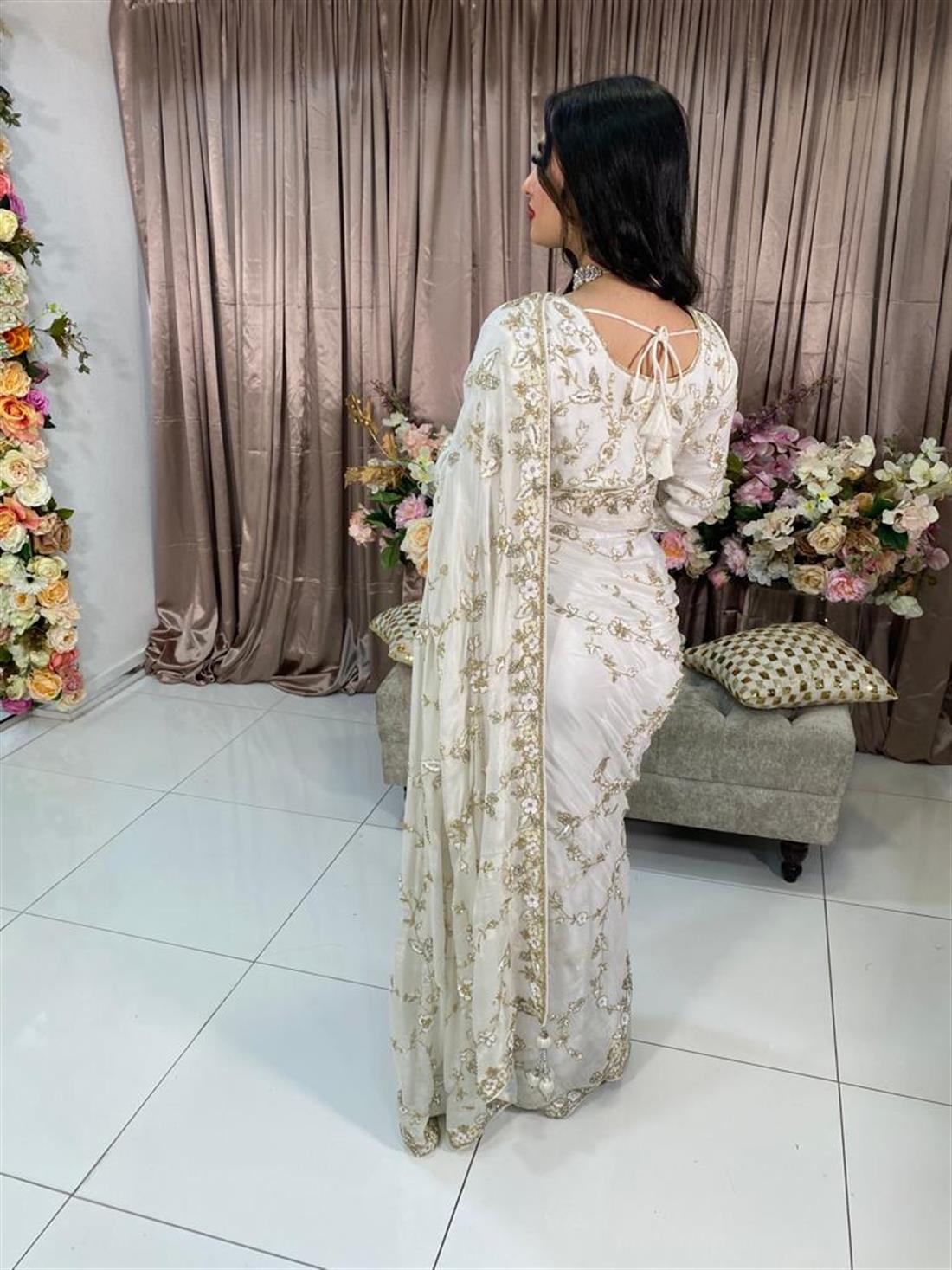 Off White Crape Silk Saree.
