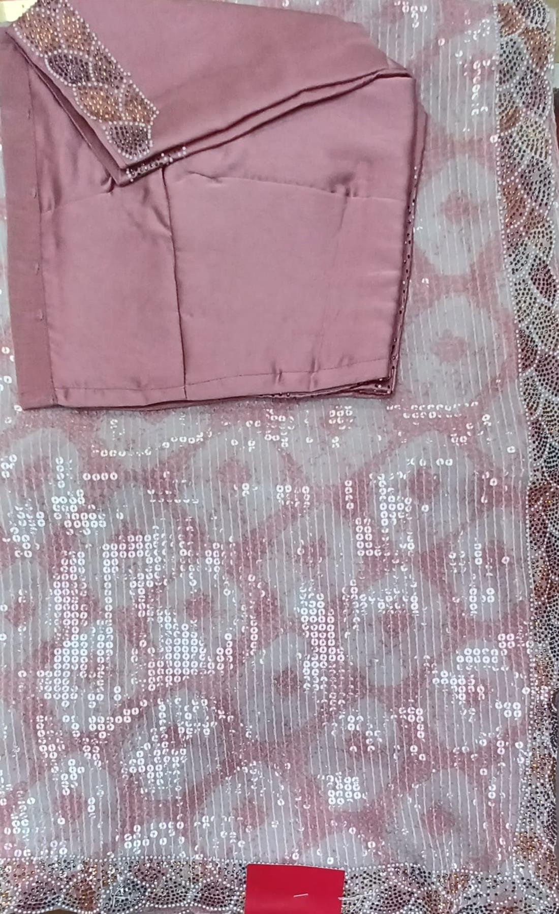 Goargette saree with sequince,stone and pearl work.It comes with readymade short sleeve blouse.
BLOUSE SIZE;10/12.
It is great to wear on partywear, weddings,and on most festive occasions like Diwali, Holi,and on Eid etc.
Product colour may slighltly vary due to photographic or the monitor display.
Dry clean only.