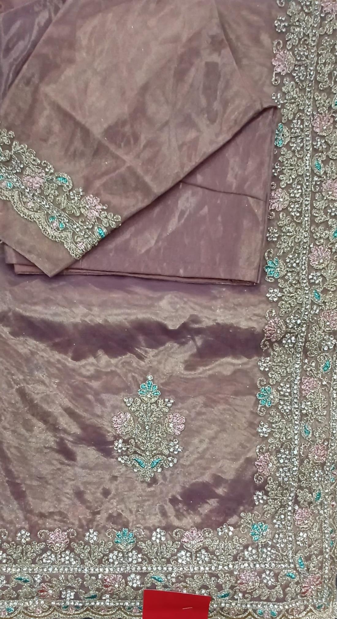 Tissue net saree with thread and stone works embroidary border.Its comes with readymade full 3quater sleeve blouse.Size10/12.
It is great to wear on partywear, weddings,and on most festive occasions like Diwali, Holi,and on Eid etc.
Product colour may slighltly vary due to photographic or the monitor display.
Dry clean only.