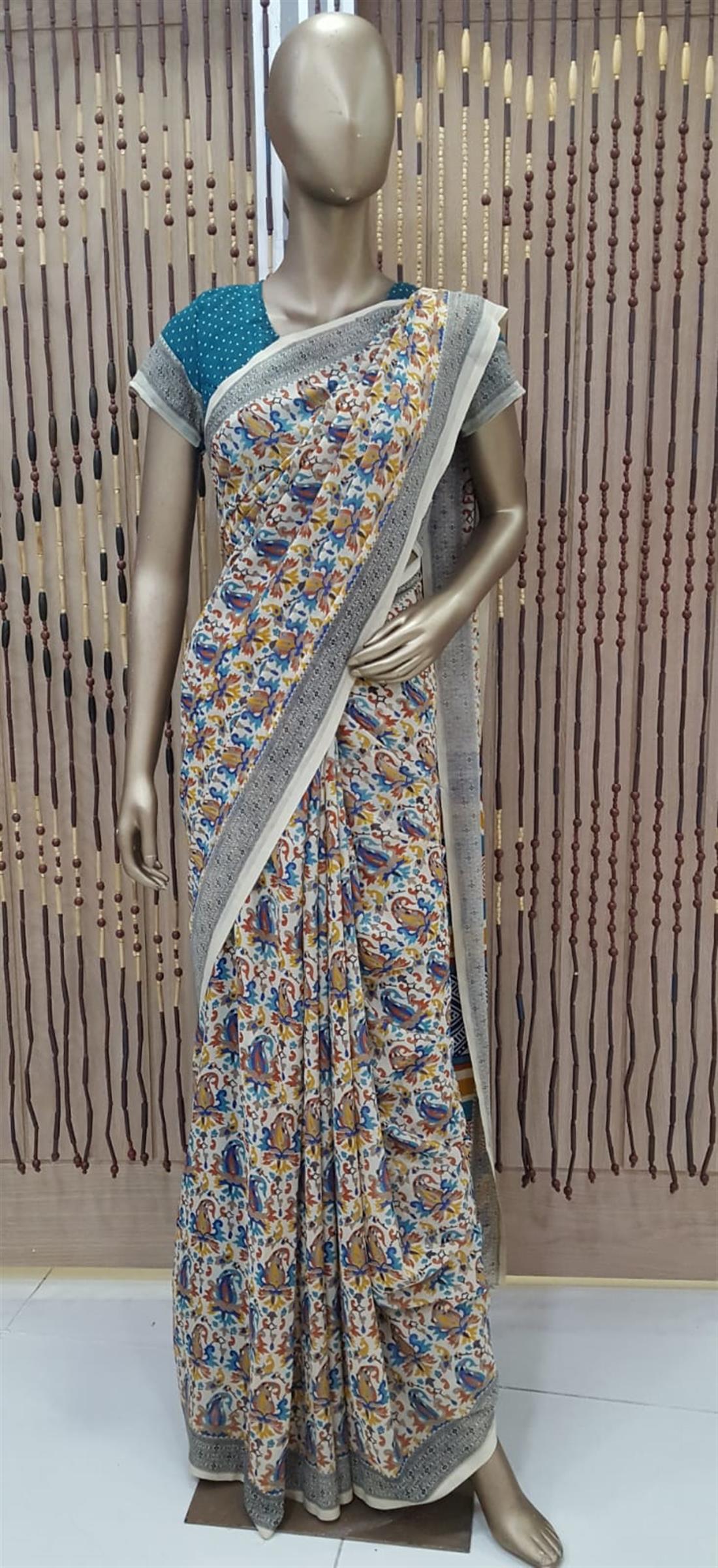 Cream & Teal Printed Georgette Sarees