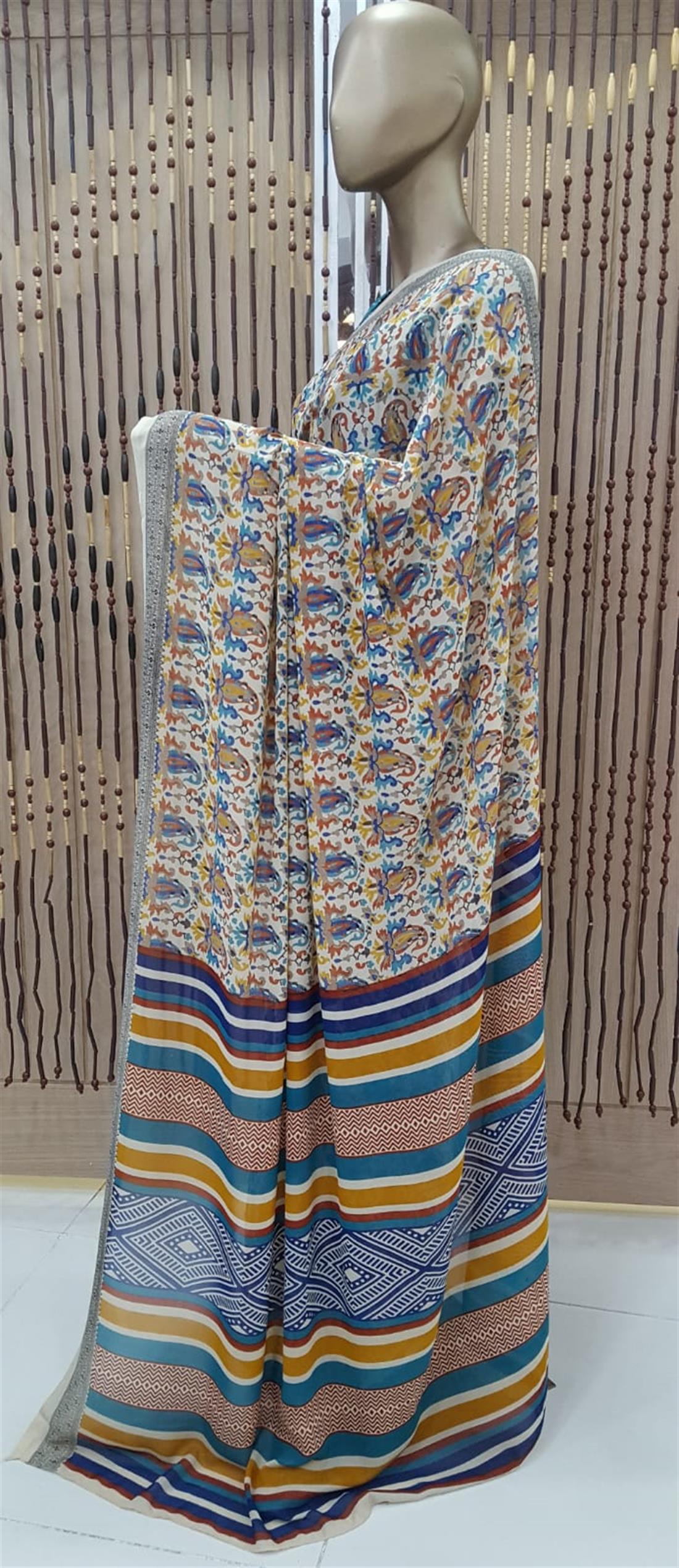 Cream & Teal Printed Georgette Sarees