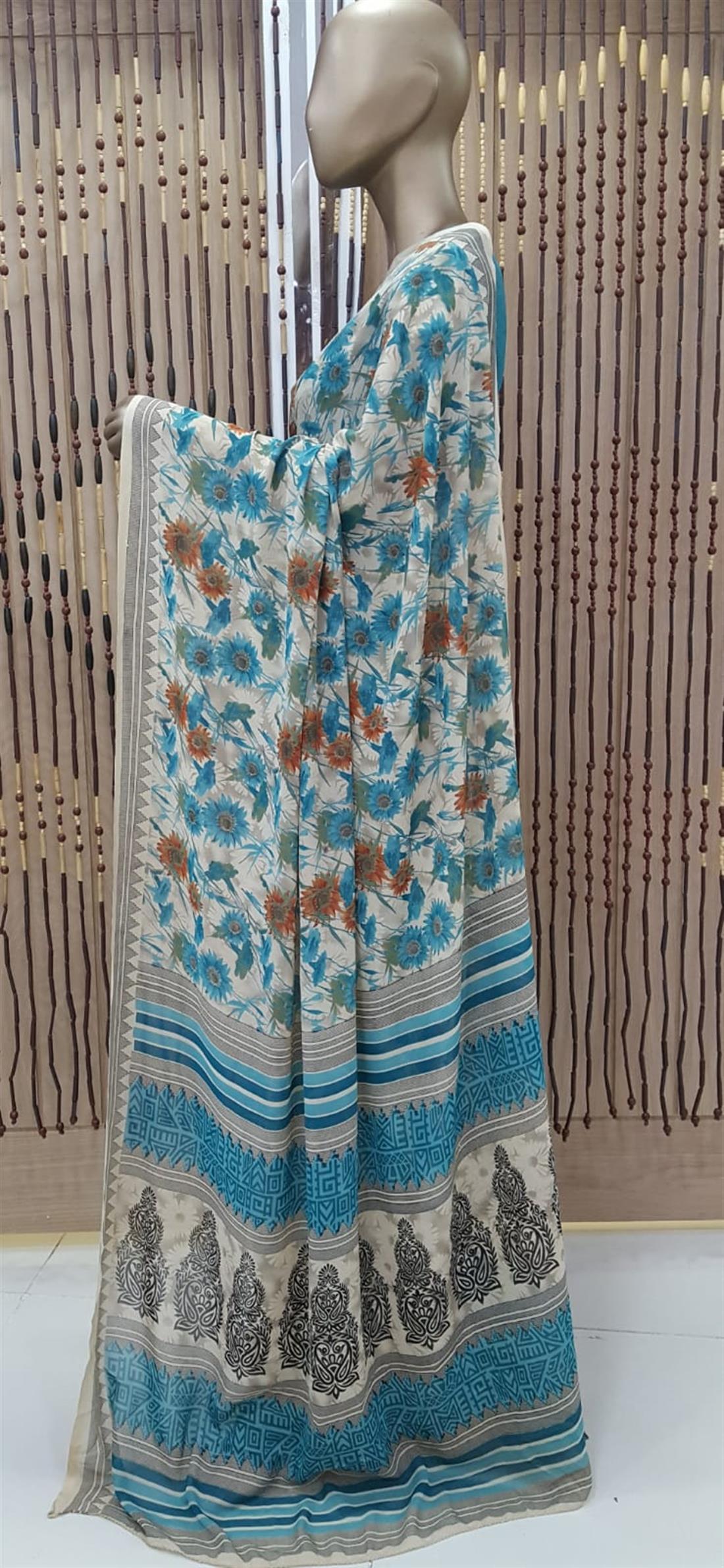 Cream & Teal Printed Georgette Sarees