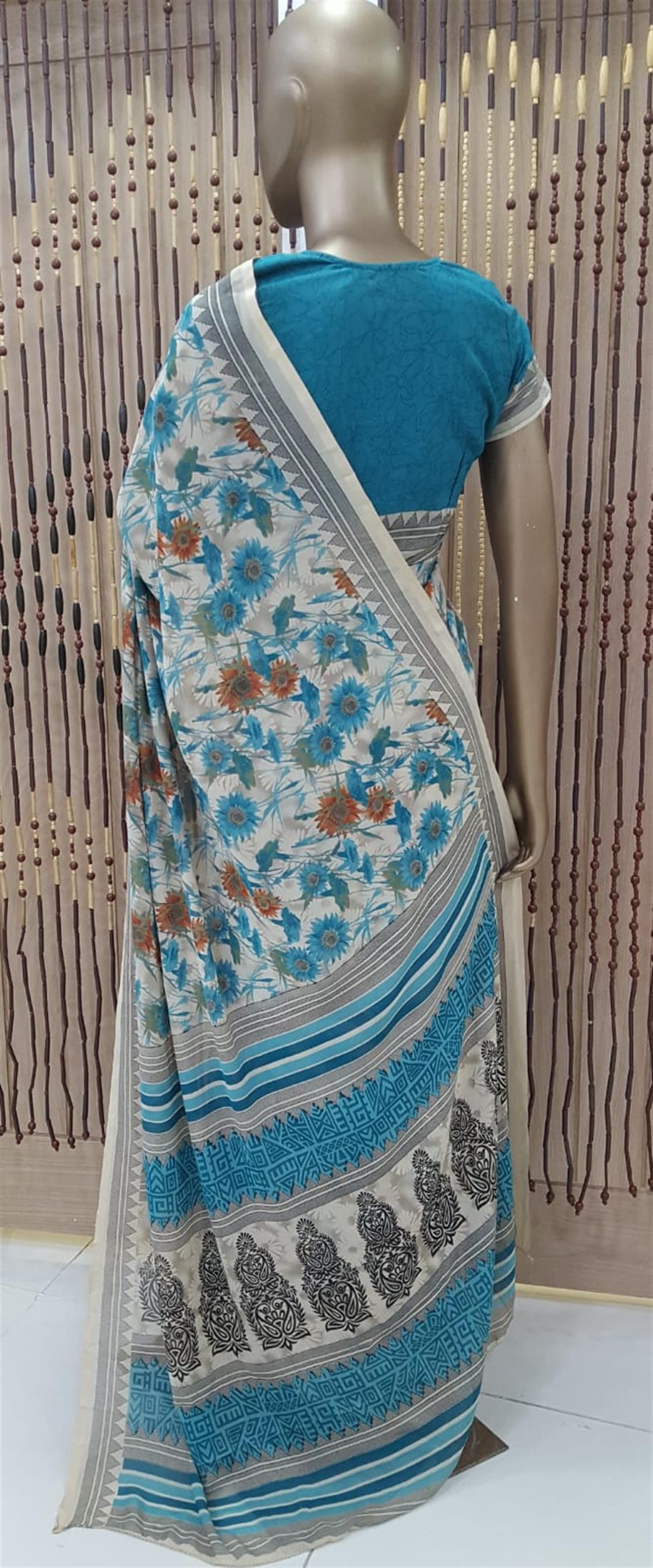 Cream & Teal Printed Georgette Sarees