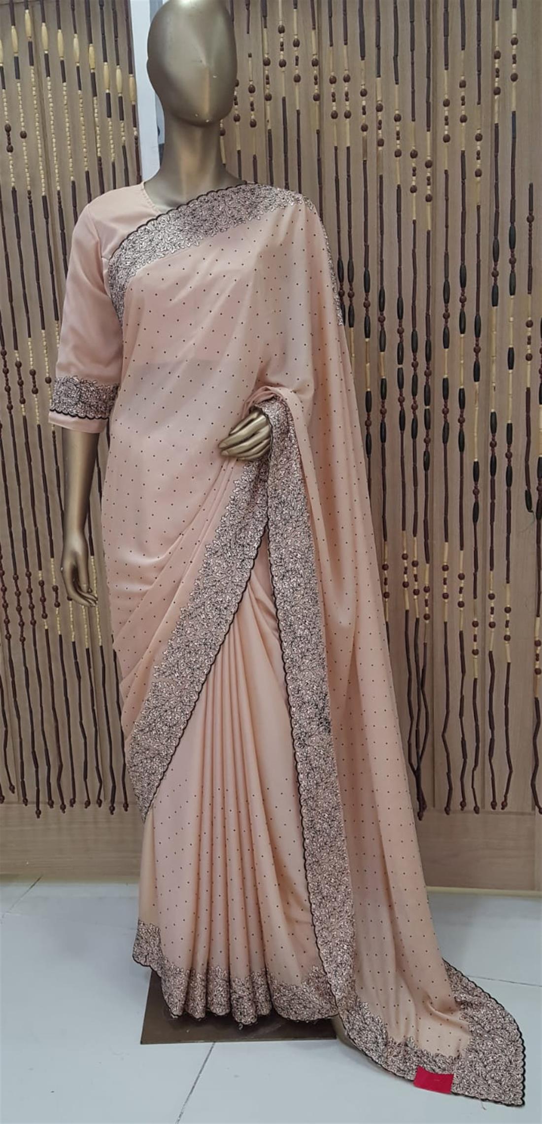 Peach Pink Beaded Crepe Sarees