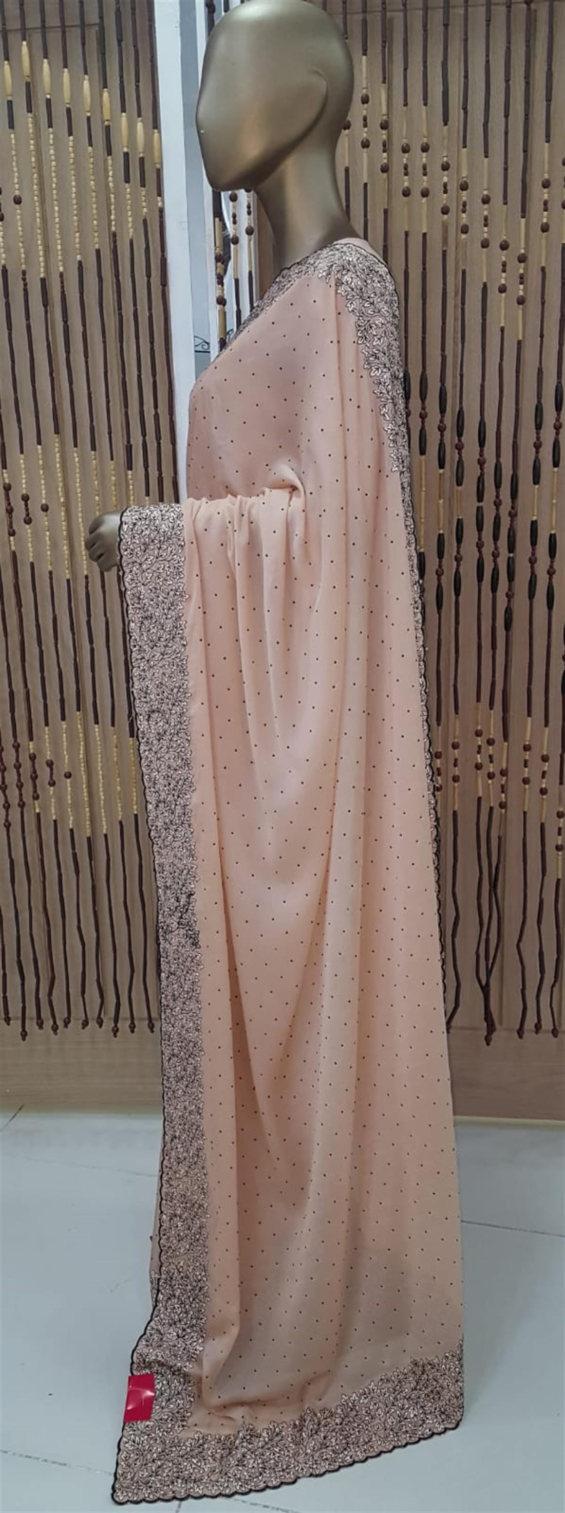 Peach Pink Beaded Crepe Sarees