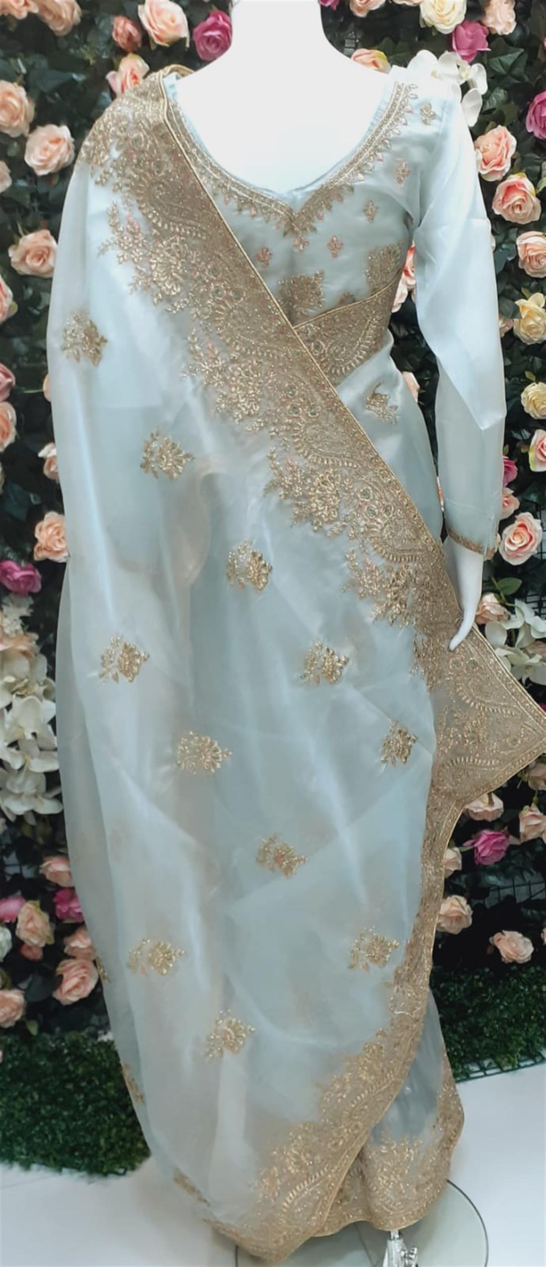 Powder Blue Tissue Net Saree with Tread Works Embroidary Border