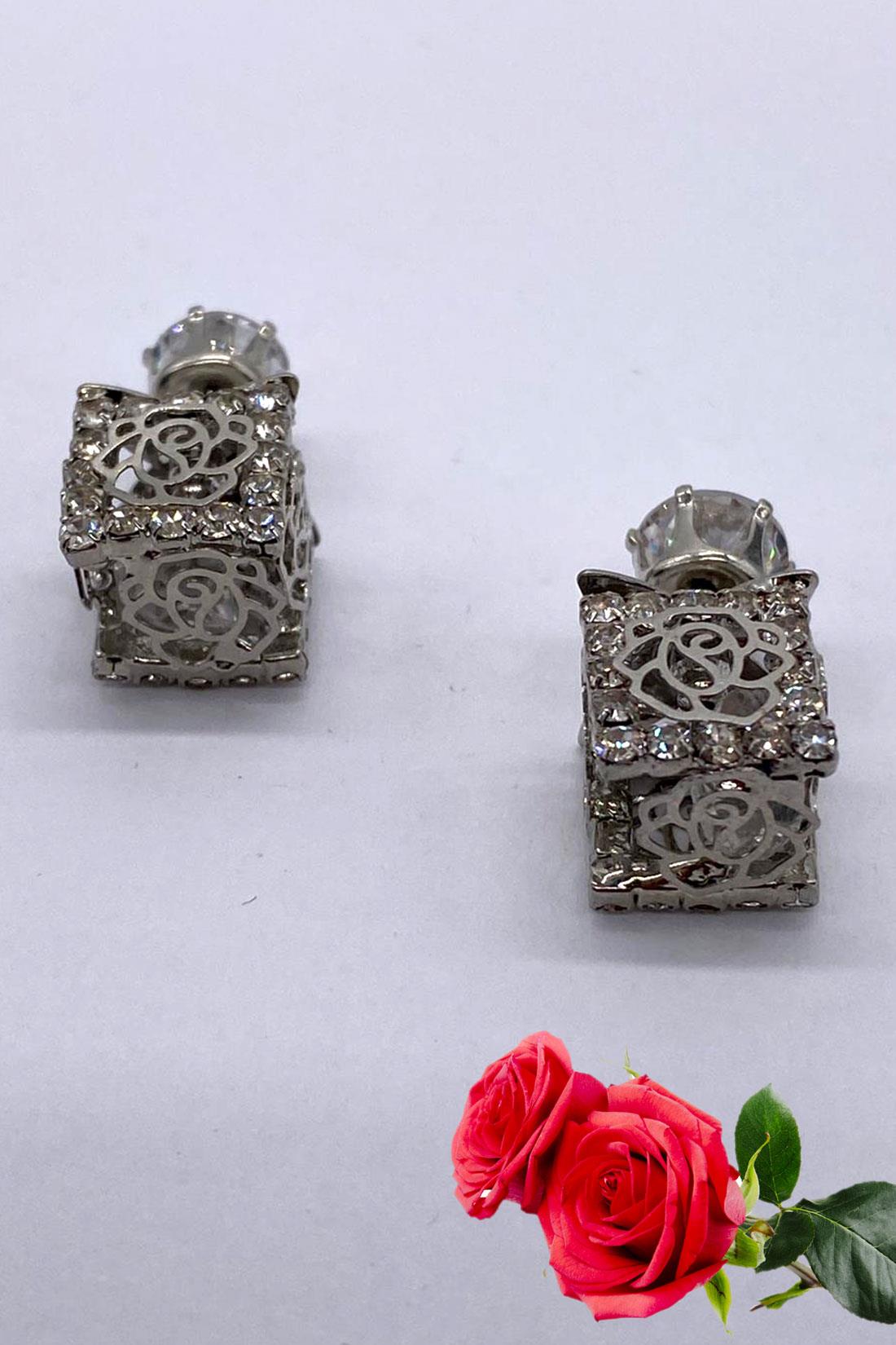 Silver Reversible Stud Earrings.
