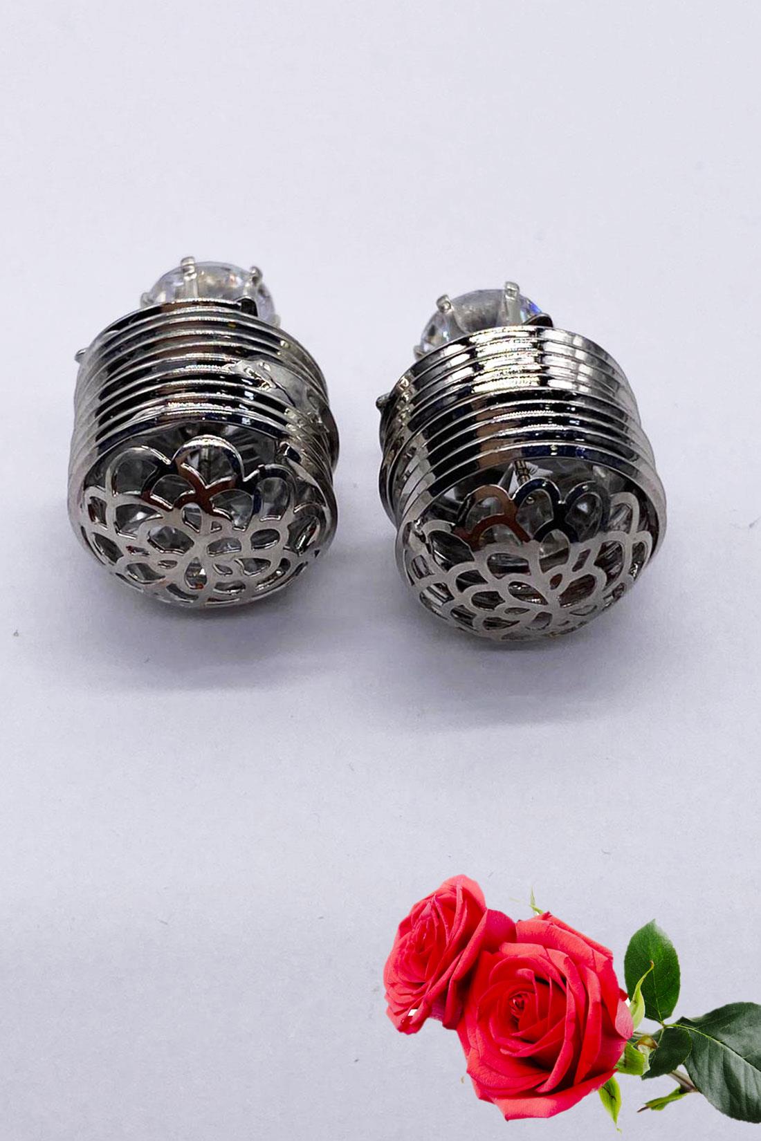 Silver Reversible Stud Earrings.