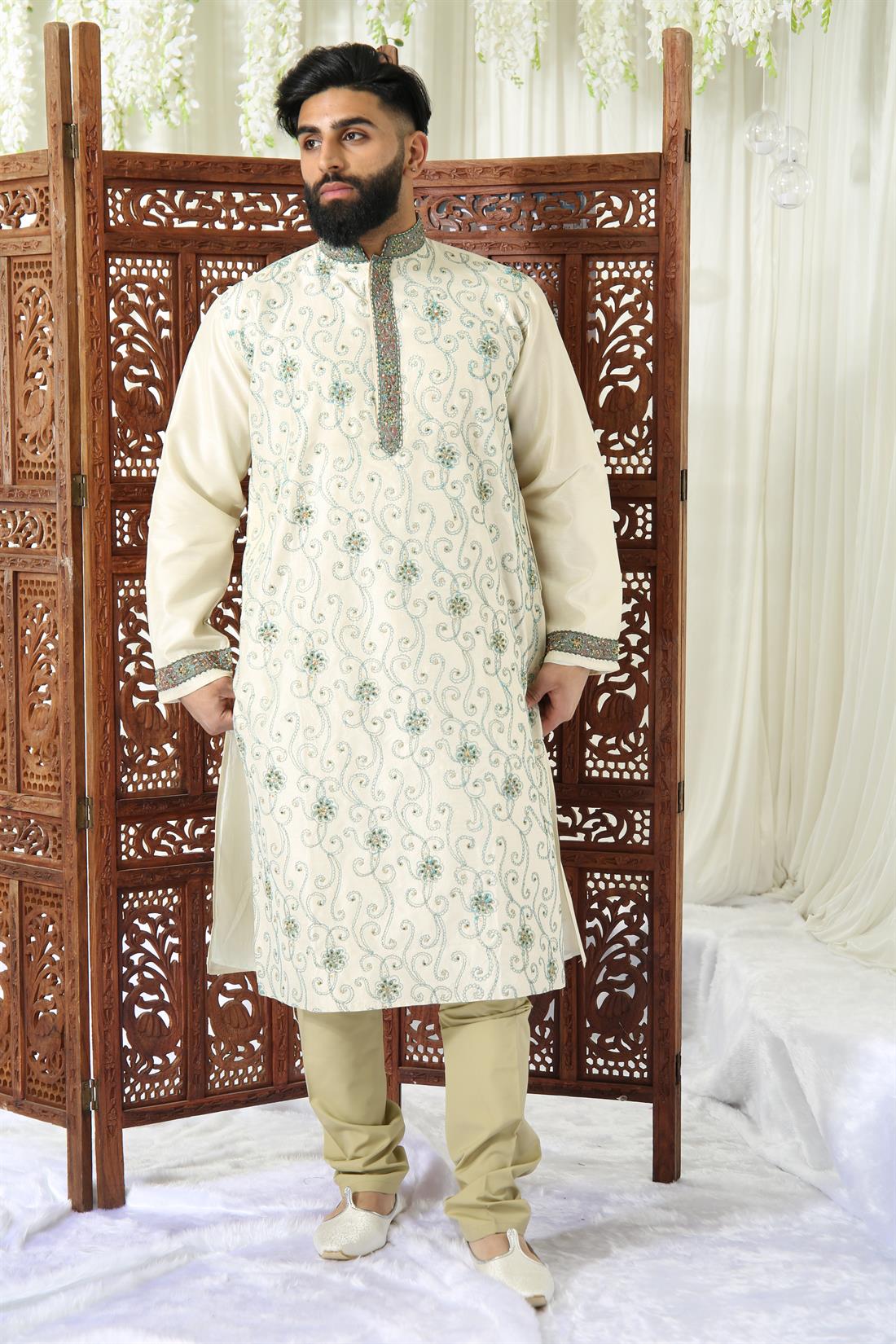 Cream Kurta with All Over Front Embroidery.