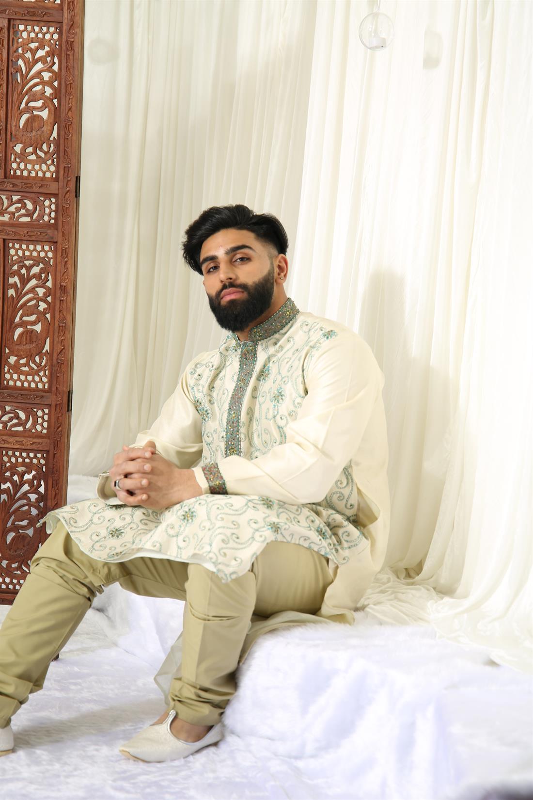 Cream Kurta with All Over Front Embroidery.