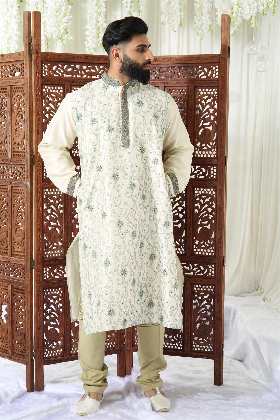 Cream Kurta with All Over Front Embroidery.