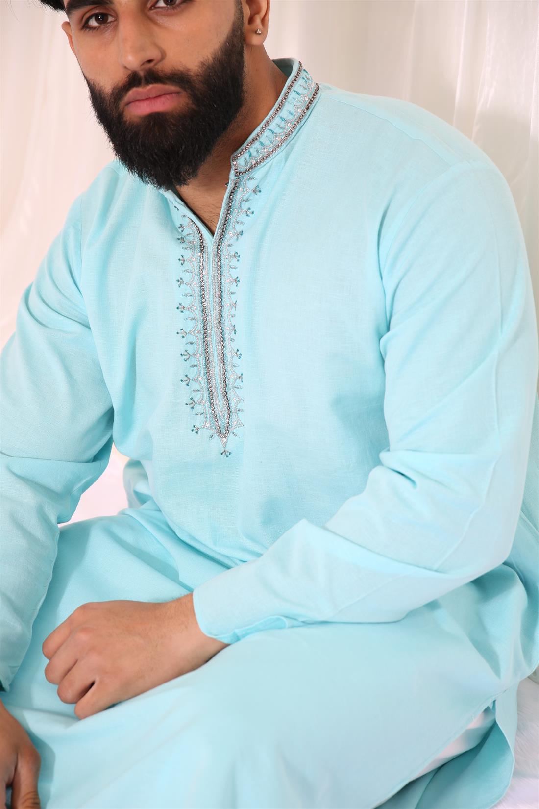 Sky Blue Kurta with White Pyjama.