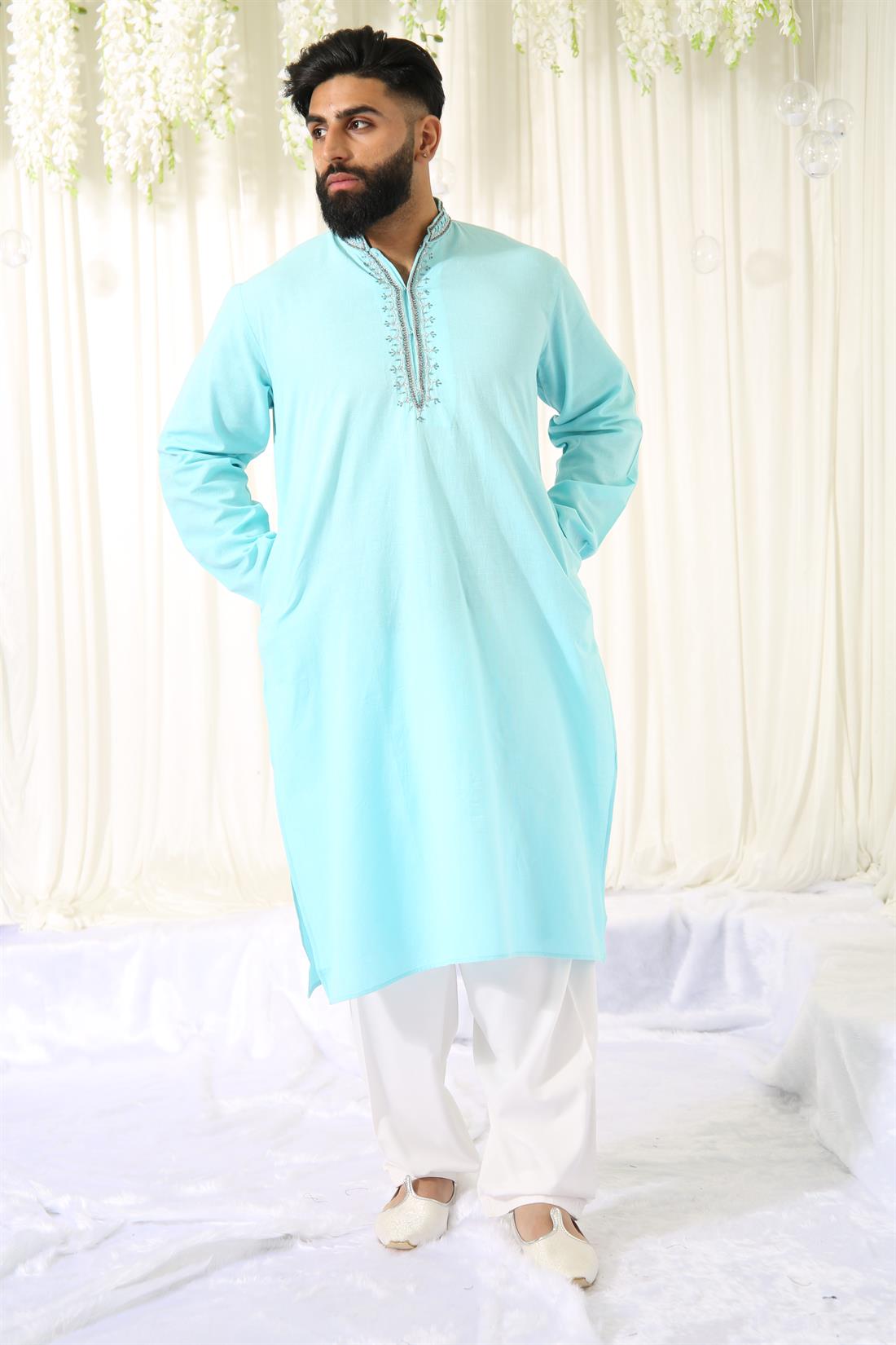 Sky Blue Kurta with White Pyjama.