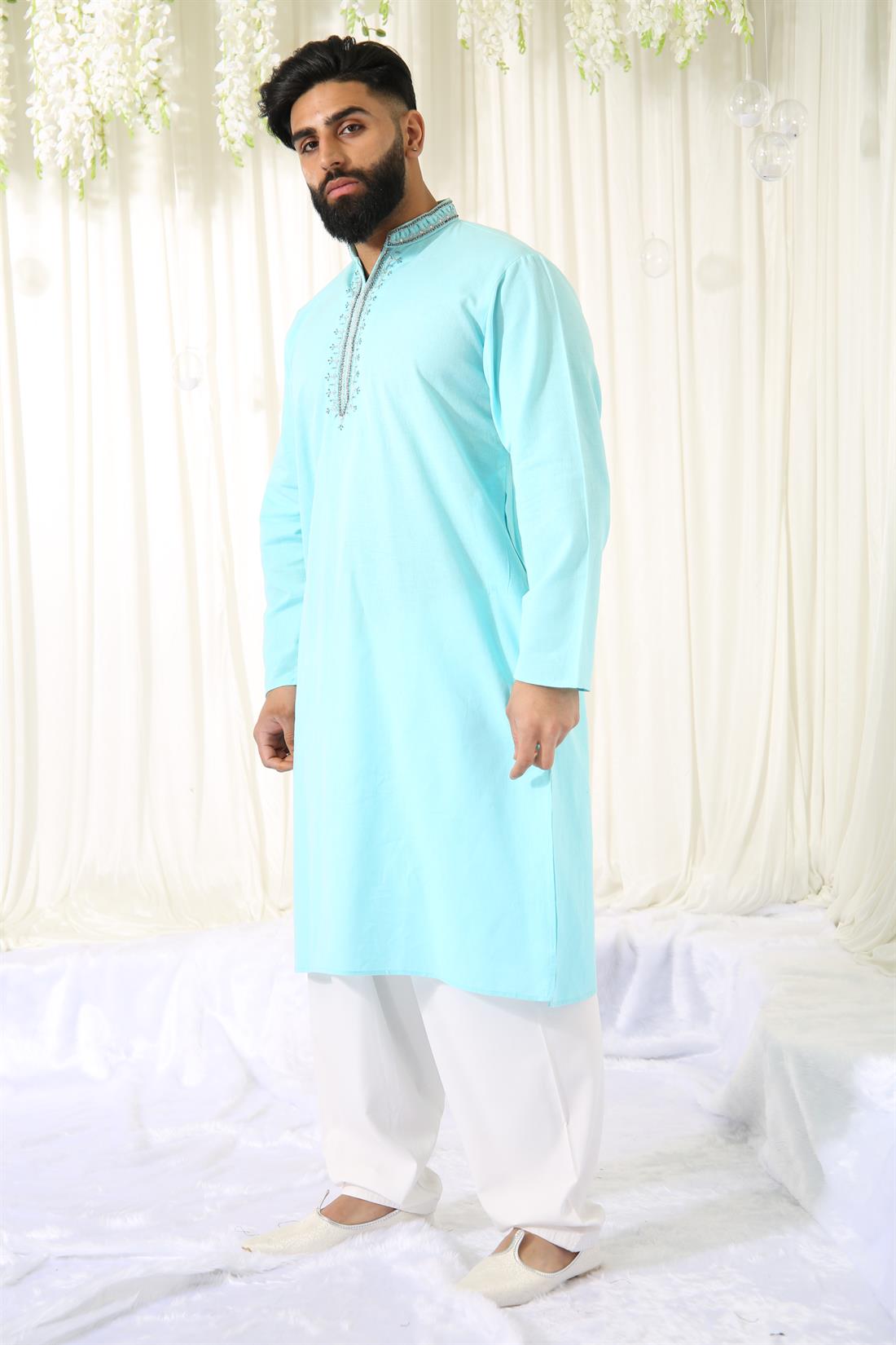 Sky Blue Kurta with White Pyjama.