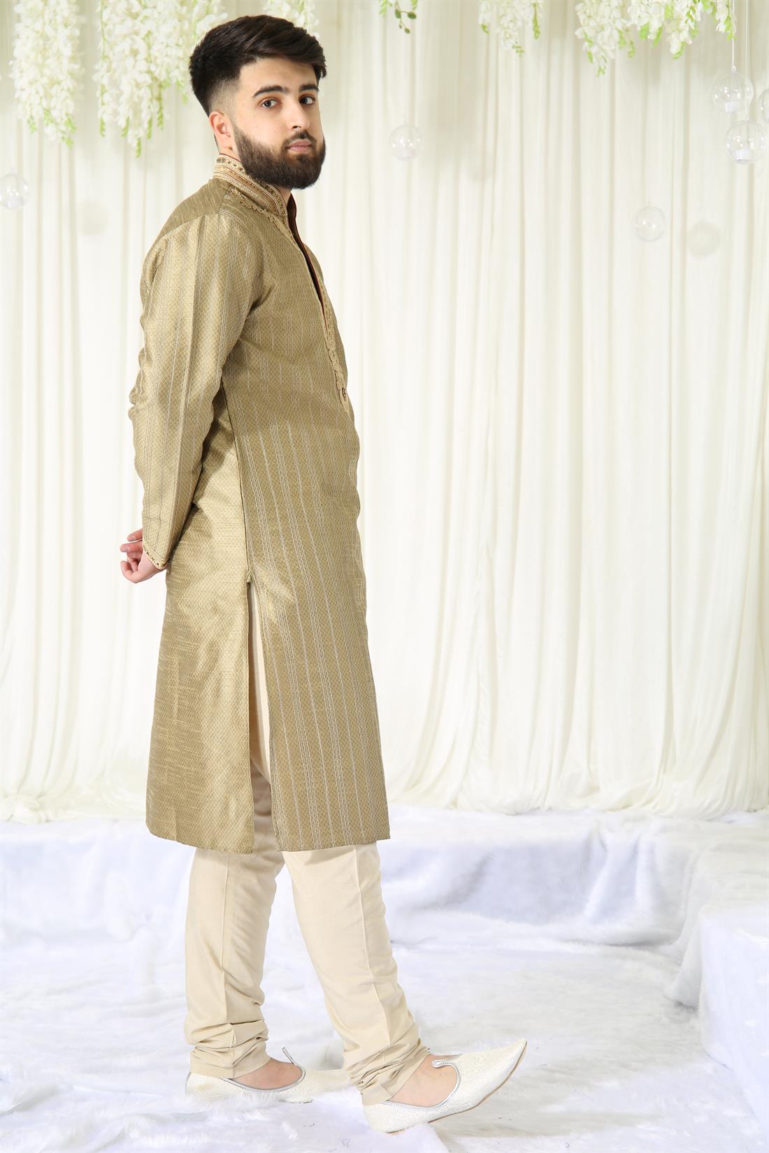 Gold Kurta with Embroidery and Touch of Maroon.