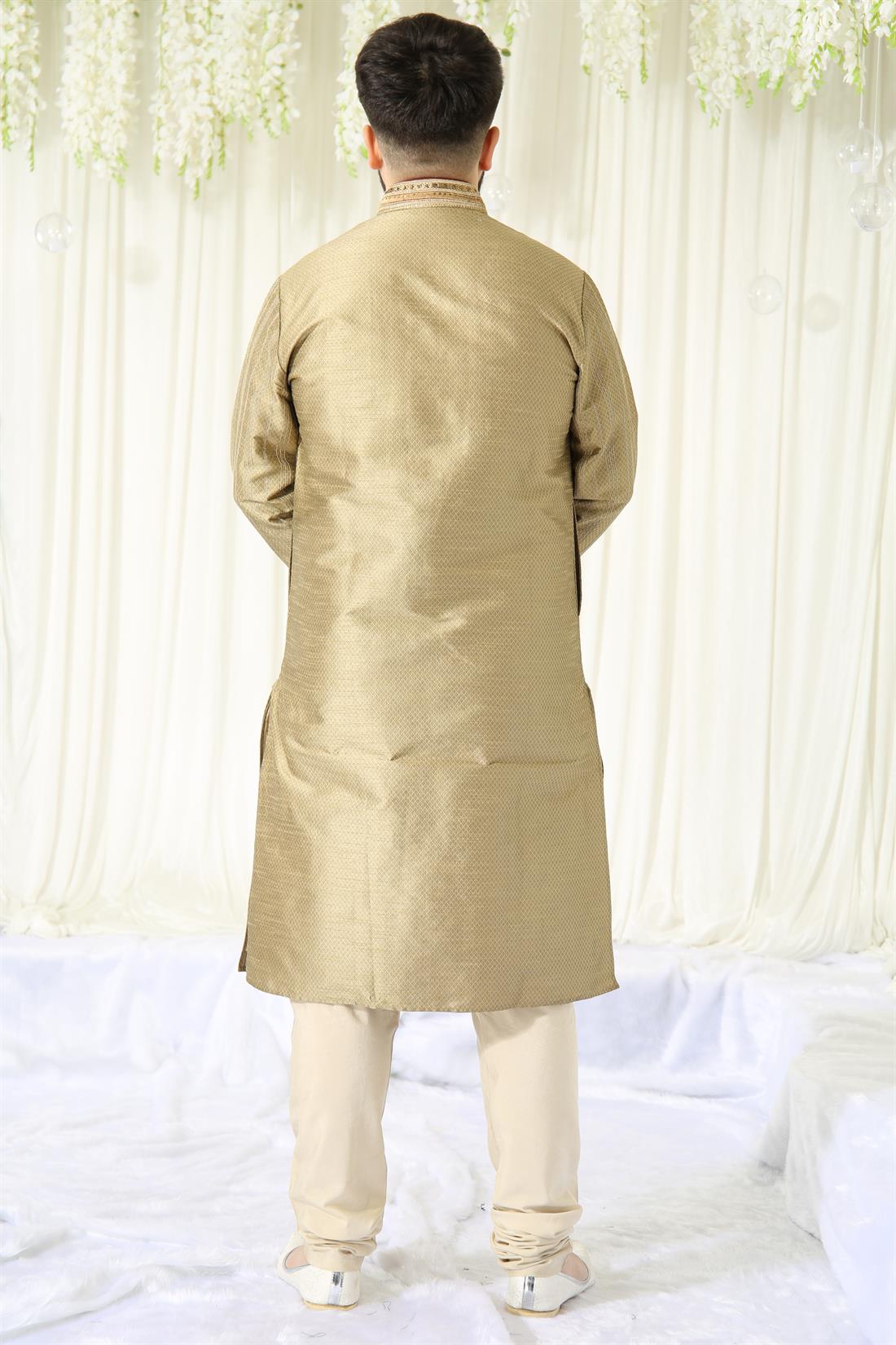 Gold Kurta with Embroidery and Touch of Maroon.