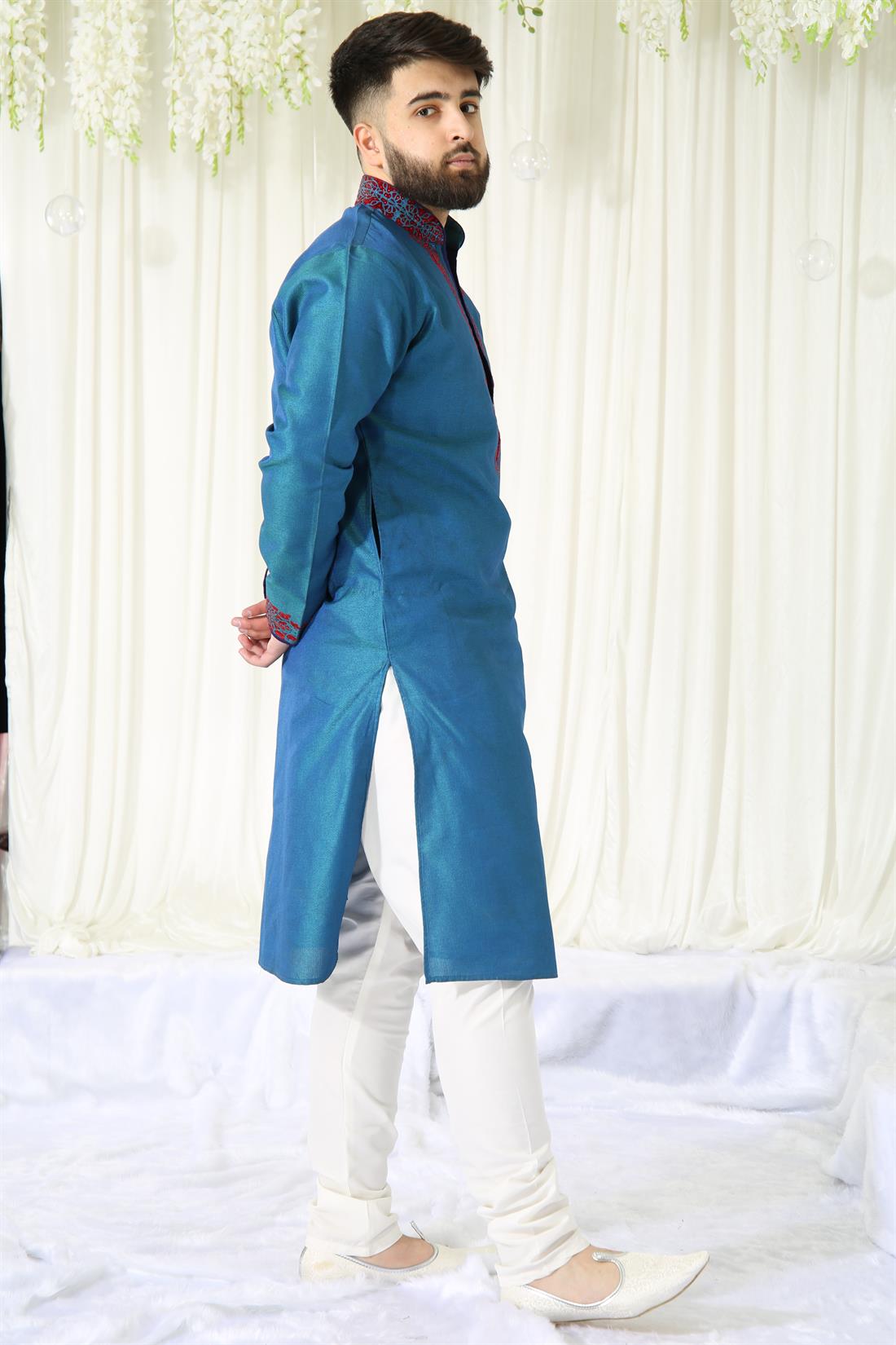 Blue Kurta with Cream Pyjama.