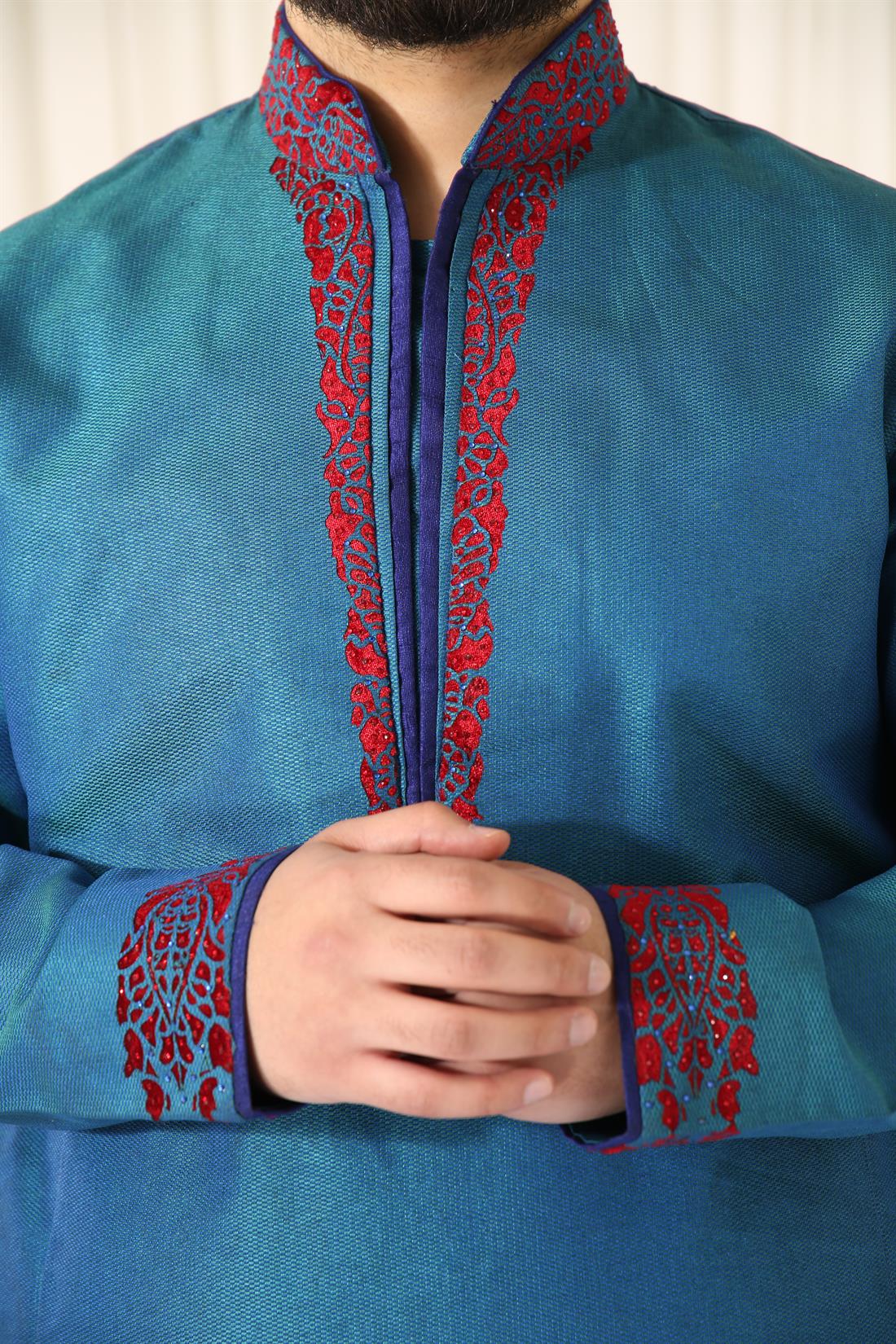 Blue Kurta with Cream Pyjama.