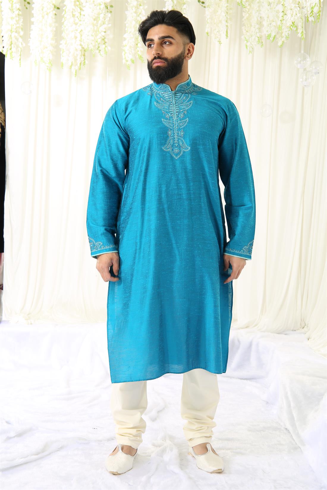 Teal Kurta with Off White Pyjama.