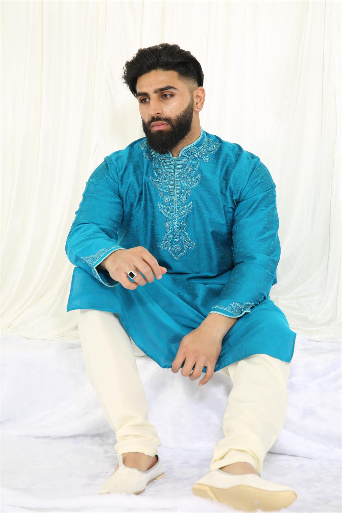 Teal Kurta with Off White Pyjama.