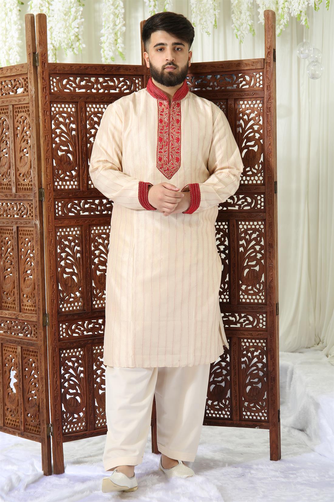 Gold Kurta Shalwar with Red Embroidery.