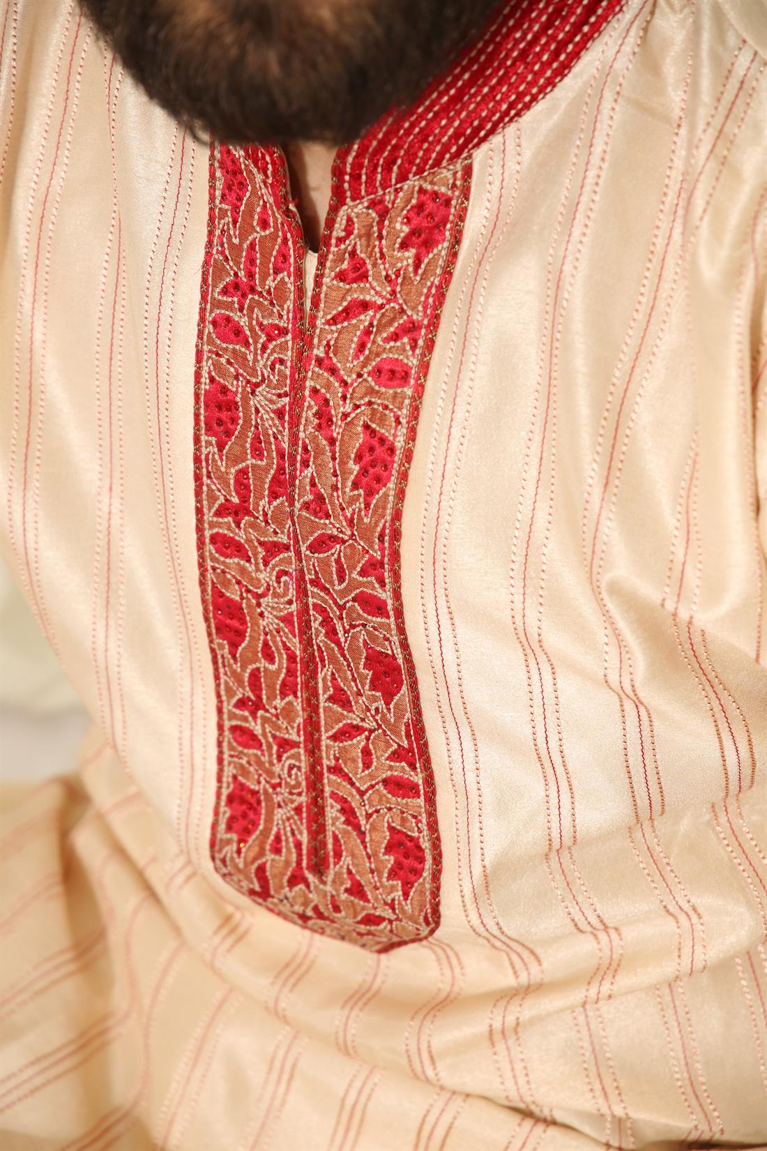 Gold Kurta Shalwar with Red Embroidery.