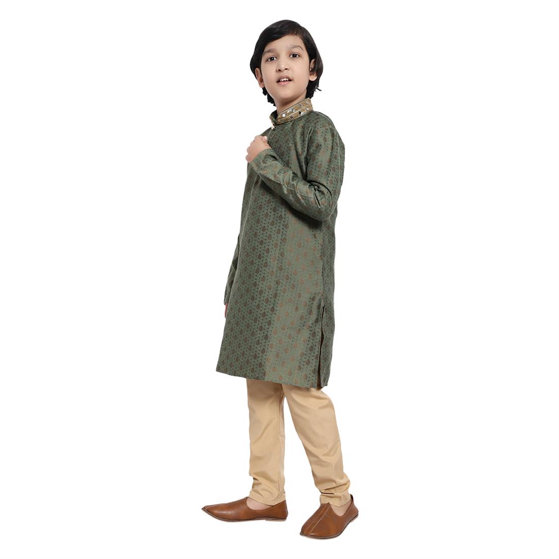 Boys Brocade Kurta Pyjama with hand embellishment. Please note colours may vary slightly due to different screen settings and photo shoot.