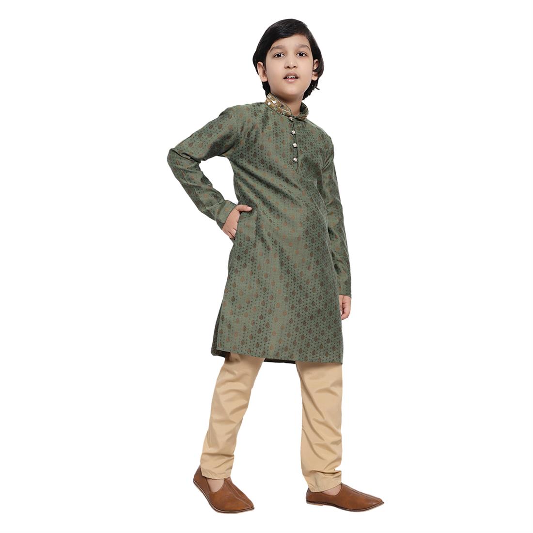 Boys Brocade Kurta Pyjama with hand embellishment. Please note colours may vary slightly due to different screen settings and photo shoot.