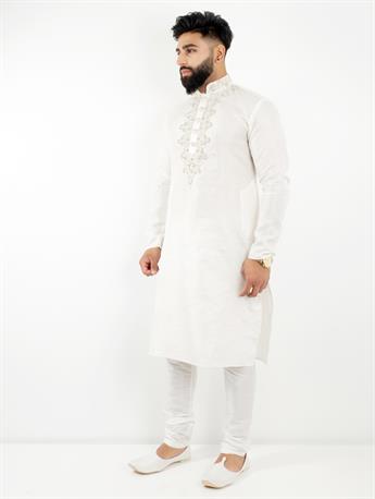 White Kurta pajma with silver emb with silver buttons a stunning piece for any occasion