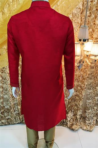 Fuchsia kurta with gold pajma. Neckline Embroidery done in gold and pink with fine piping detailing